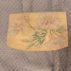 Embroidered clutch